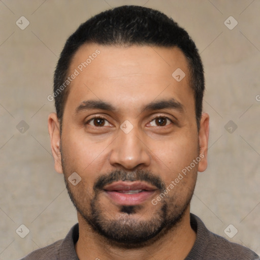 Joyful latino young-adult male with short  black hair and brown eyes