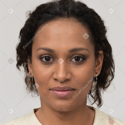 Joyful black young-adult female with medium  brown hair and brown eyes