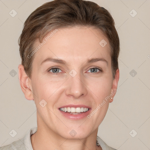 Joyful white young-adult female with short  brown hair and grey eyes