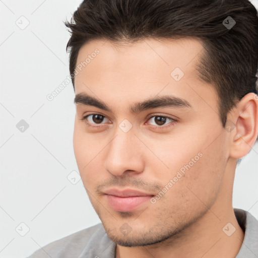 Neutral white young-adult male with short  brown hair and brown eyes