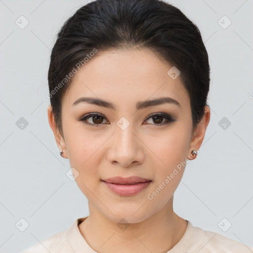 Joyful asian young-adult female with short  brown hair and brown eyes