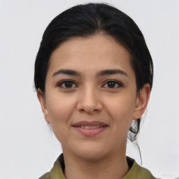 Joyful asian young-adult female with medium  brown hair and brown eyes