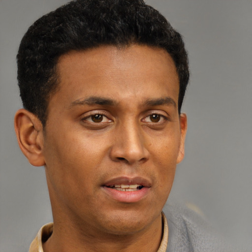 Neutral latino young-adult male with short  brown hair and brown eyes