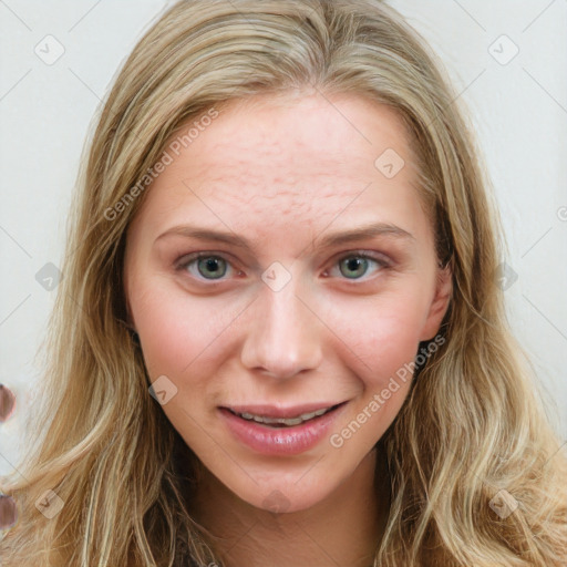 Joyful white young-adult female with long  brown hair and blue eyes