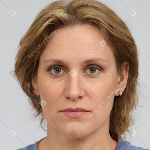 Joyful white young-adult female with medium  brown hair and green eyes