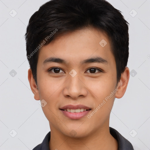 Joyful asian young-adult male with short  brown hair and brown eyes