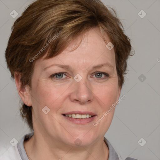 Joyful white adult female with medium  brown hair and blue eyes