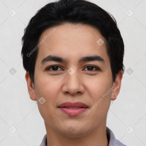 Joyful asian young-adult male with short  black hair and brown eyes