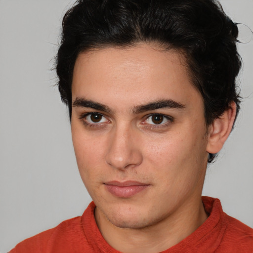 Neutral white young-adult male with medium  brown hair and brown eyes