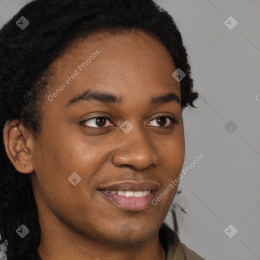 Joyful black young-adult female with long  brown hair and brown eyes