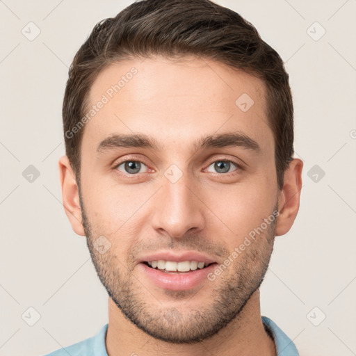 Joyful white young-adult male with short  brown hair and brown eyes