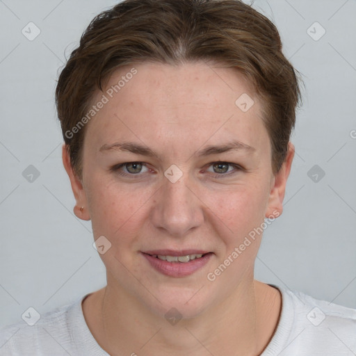 Joyful white young-adult female with short  brown hair and grey eyes