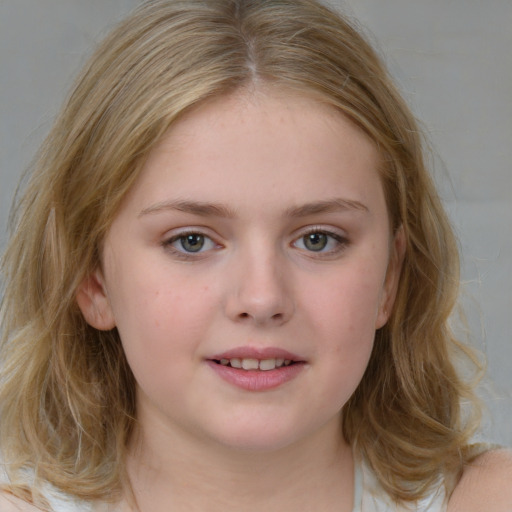 Joyful white child female with medium  brown hair and blue eyes