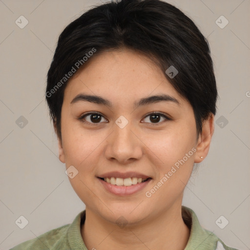 Joyful asian young-adult female with short  brown hair and brown eyes