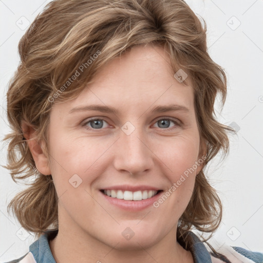 Joyful white young-adult female with medium  brown hair and blue eyes