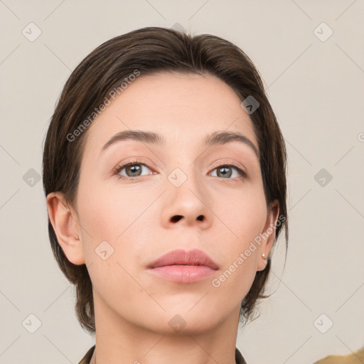 Neutral white young-adult female with medium  brown hair and grey eyes