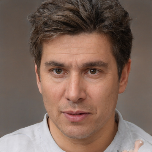 Neutral white adult male with short  brown hair and brown eyes