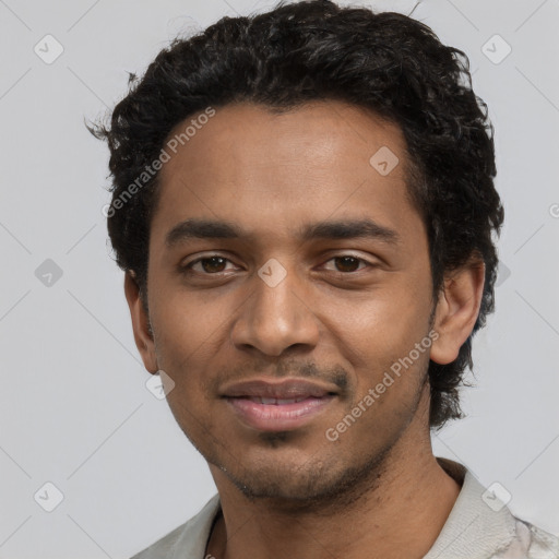 Joyful black young-adult male with short  black hair and brown eyes