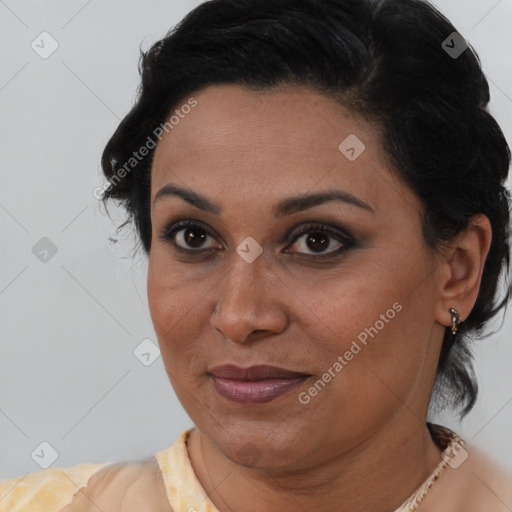 Joyful latino young-adult female with medium  brown hair and brown eyes