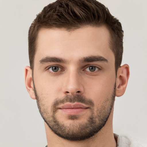 Neutral white young-adult male with short  brown hair and brown eyes