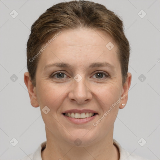 Joyful white young-adult female with short  brown hair and grey eyes