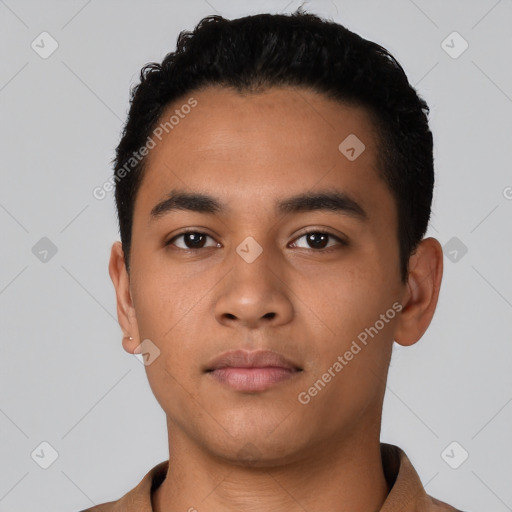 Neutral latino young-adult male with short  black hair and brown eyes