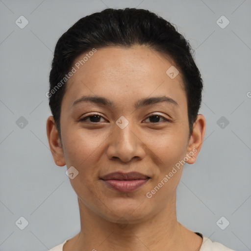 Joyful asian young-adult female with short  black hair and brown eyes