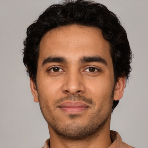 Neutral latino young-adult male with short  brown hair and brown eyes