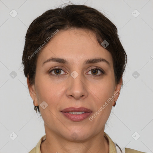 Joyful white adult female with short  brown hair and brown eyes