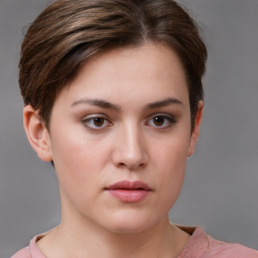 Neutral white young-adult female with short  brown hair and brown eyes