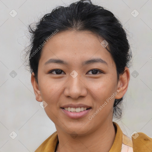 Joyful asian young-adult female with short  brown hair and brown eyes