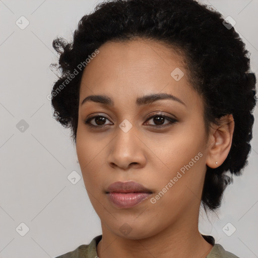 Neutral black young-adult female with medium  black hair and brown eyes