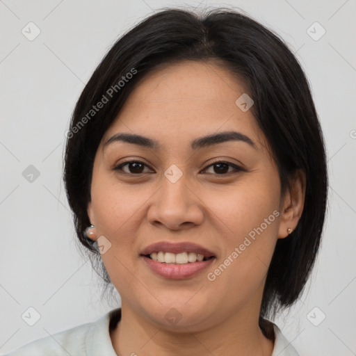 Joyful asian young-adult female with medium  black hair and brown eyes