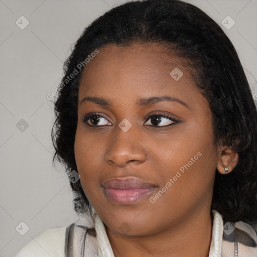 Joyful black young-adult female with medium  black hair and brown eyes