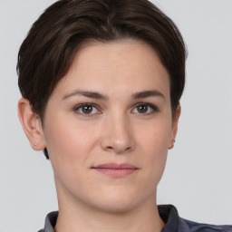 Neutral white young-adult female with short  brown hair and brown eyes