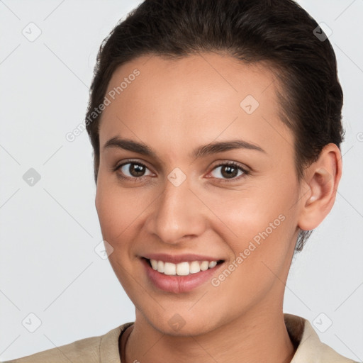 Joyful white young-adult female with short  brown hair and brown eyes