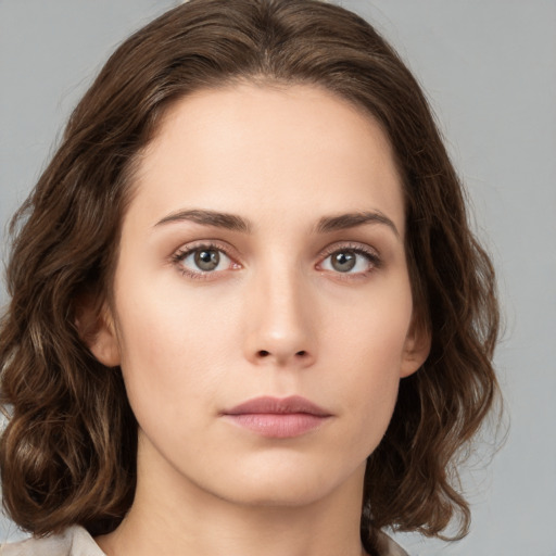 Neutral white young-adult female with medium  brown hair and brown eyes
