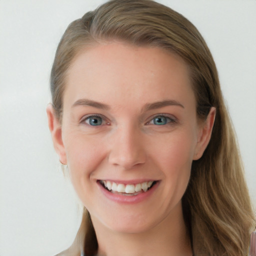 Joyful white young-adult female with long  brown hair and blue eyes