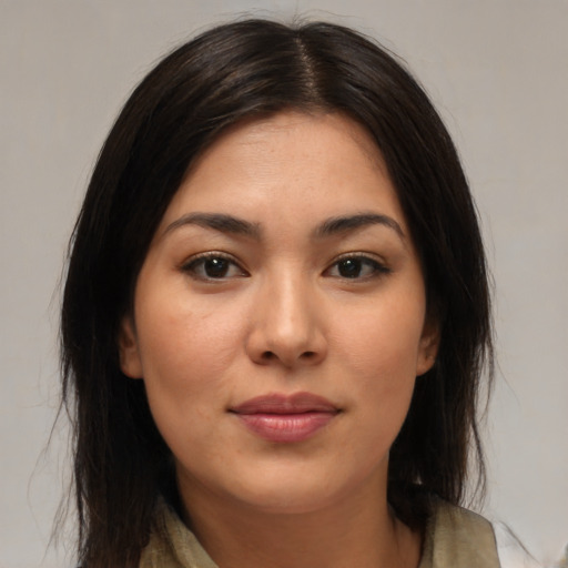 Joyful asian young-adult female with medium  brown hair and brown eyes