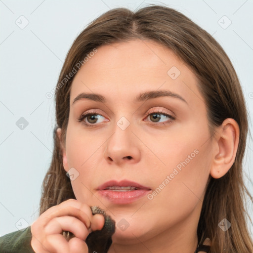 Neutral white young-adult female with long  brown hair and brown eyes