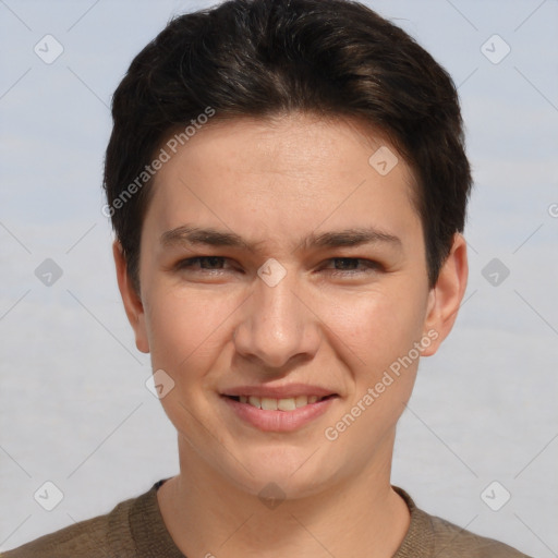 Joyful white young-adult female with short  brown hair and brown eyes