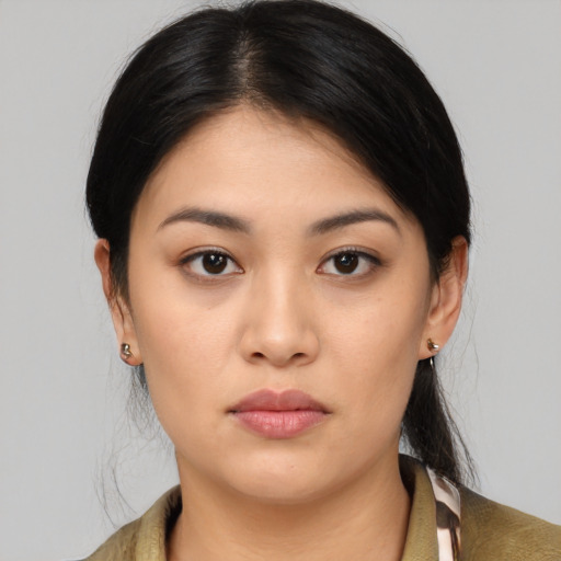 Neutral asian young-adult female with medium  black hair and brown eyes