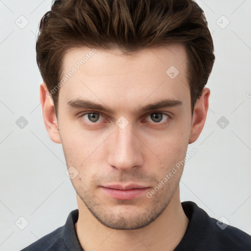 Neutral white young-adult male with short  brown hair and grey eyes