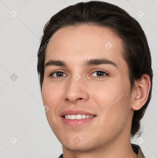 Joyful white young-adult female with short  brown hair and brown eyes