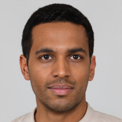 Neutral black young-adult male with short  black hair and brown eyes