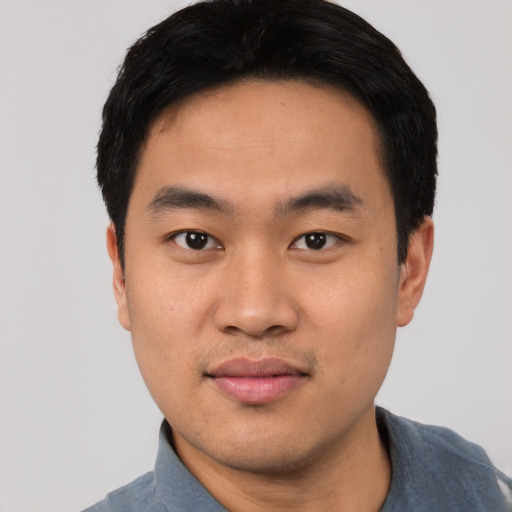 Neutral asian young-adult male with short  black hair and brown eyes