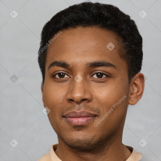 Joyful black young-adult male with short  black hair and brown eyes