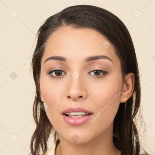 Neutral white young-adult female with long  brown hair and brown eyes