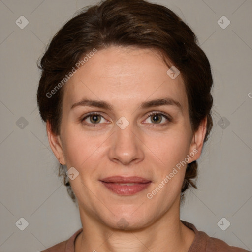 Joyful white adult female with medium  brown hair and grey eyes