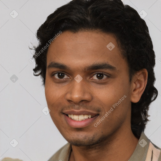 Joyful black young-adult male with short  brown hair and brown eyes